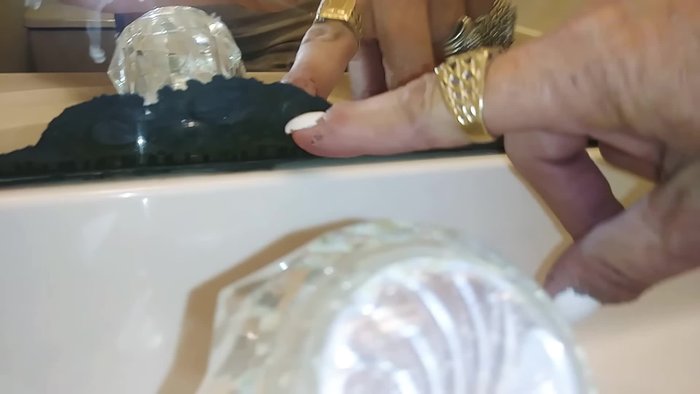 Clean the area around the damaged frame with alcohol.