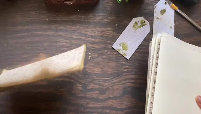 Cut the signatures down to size, leaving a small space (about 1/4 inch) from the edges to prevent damage.