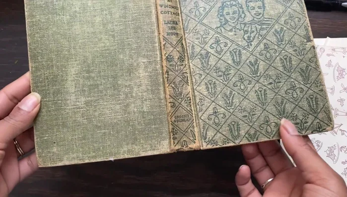 Cut out the text block from the thrifted book. This is easier with older books.