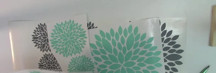 Weed your design. Carefully remove the excess vinyl from around your cut design elements.