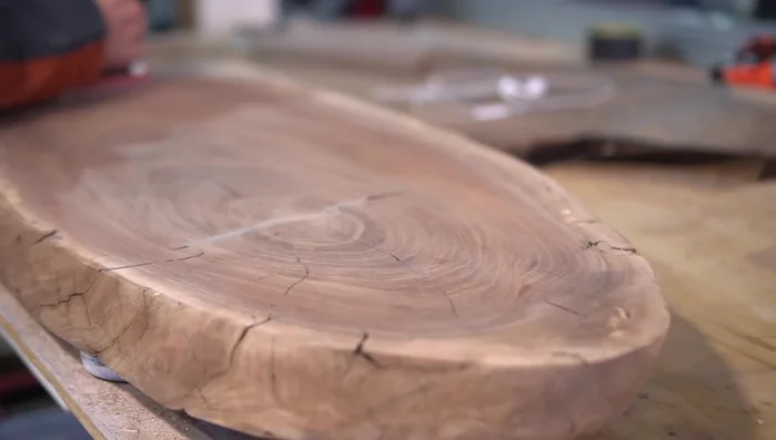 Sand down the filled areas.