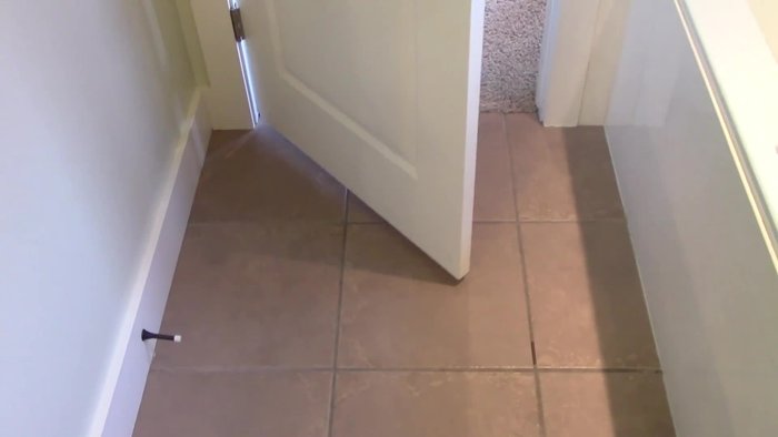 Identify the problem: The door doesn't stay in the desired position due to incorrect framing during installation.