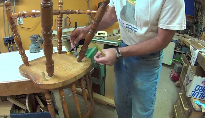 Apply epoxy to secure the dowel.