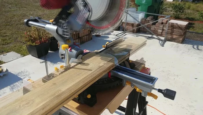 Prepare the fence boards: Cut off the pointy ends of the fence boards. Cut two boards to 71 inches long. Cut three boards into four pieces, each 17 3/4 inches long. Cut three 36-inch balusters in half.