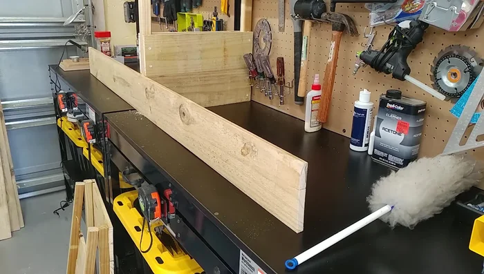 Assemble the sides: Attach the remaining long (71-inch) boards to the ends, forming the sides of the raised bed. Ensure proper alignment.