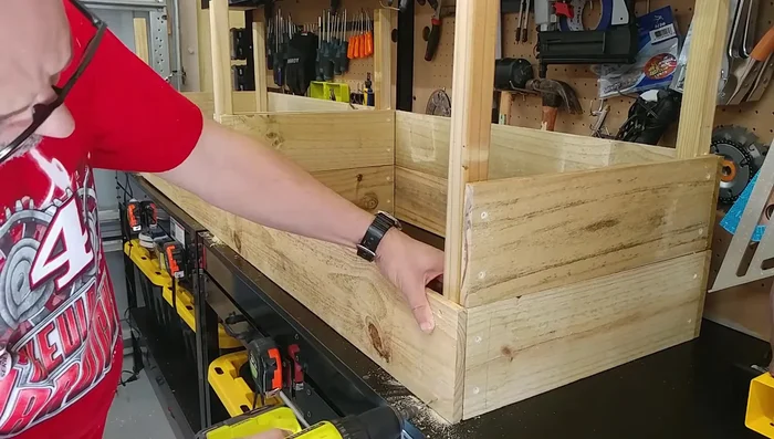 Flip and repeat step 4: Flip the structure and repeat step 4 to attach the other long boards.