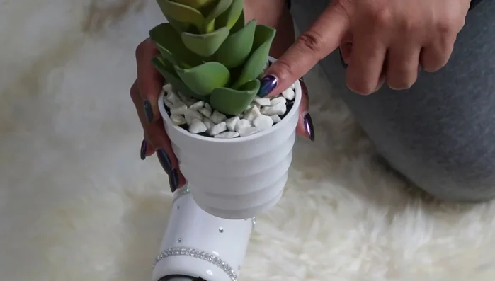 Add height to a crystal bowl using a glued-on tea light candle for a unique decorative element.