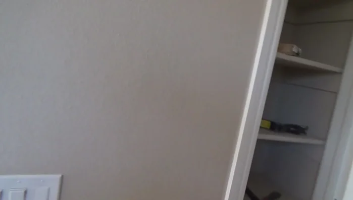 If necessary, adjust the strike plate by moving it slightly and re-installing it to further refine the door alignment. 