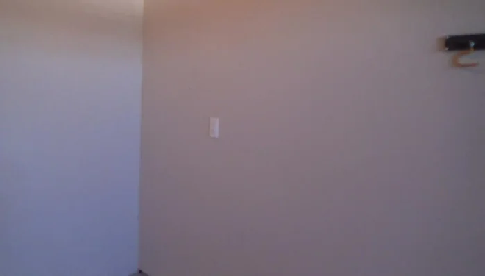 If necessary, adjust the strike plate by moving it slightly and re-installing it to further refine the door alignment. 