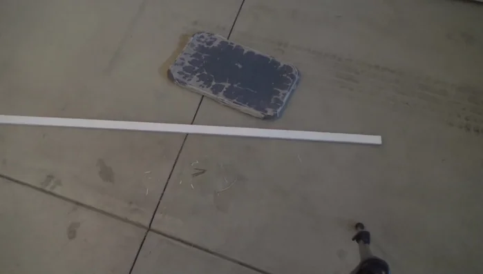 Test the door closure. Adjust door stop placement as needed using a 2x4 block and gentle hammer taps if necessary.