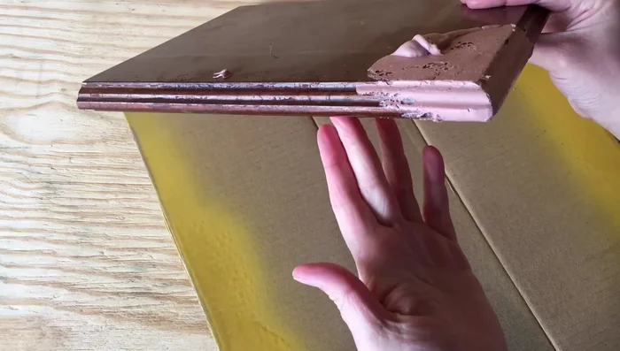 Once the Bondo has begun to harden, carefully remove the mold. Use a utility knife to remove excess Bondo before it fully hardens.