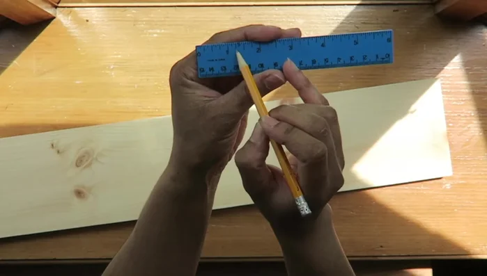 Paint the boards (optional): Paint the boards while the rope is hanging to get a sense of the shelf's placement.