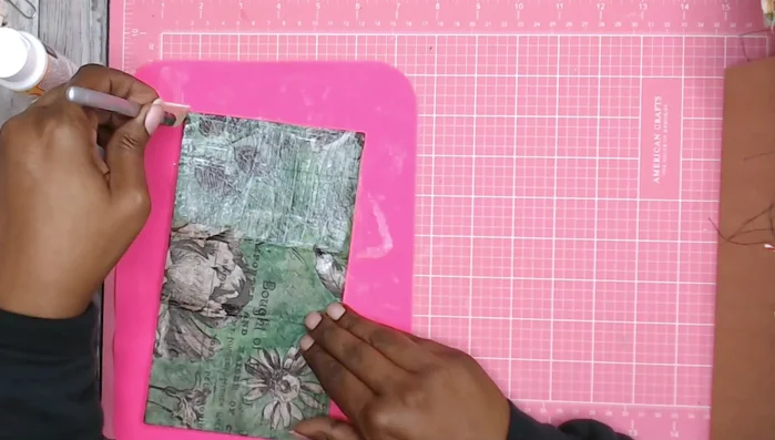 Finish the cover: Seal the cover with Mod Podge to protect the paint and embellishments.