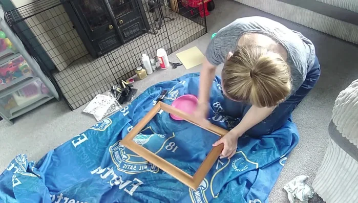 Wipe the frame with a damp cloth to remove dust.