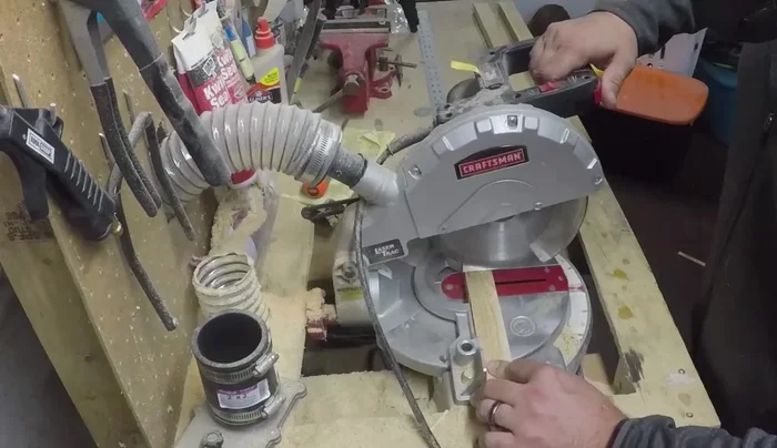 Cut the boards to their final length of 24 inches using a stop block for consistent cuts.