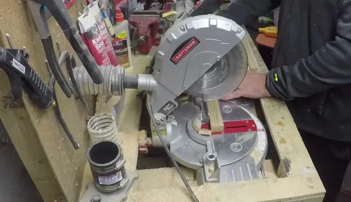 Cut the boards to their final length of 24 inches using a stop block for consistent cuts.