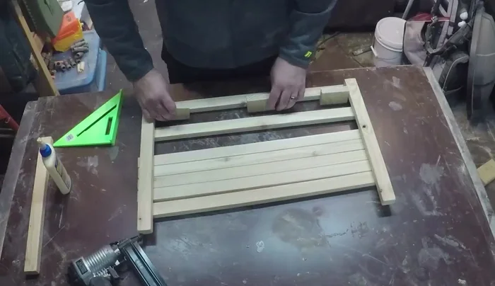 Trim the excess length from the bottom supports using a flush-cut saw for a clean finish.