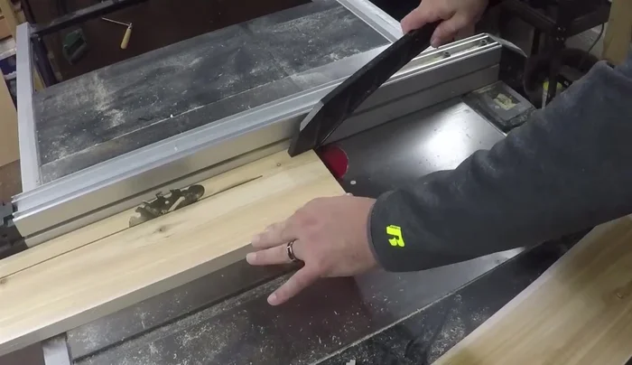 Cut the boards to their final length of 24 inches using a stop block for consistent cuts.