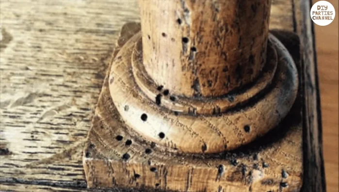 Clean the surface and fill any holes with stucco.