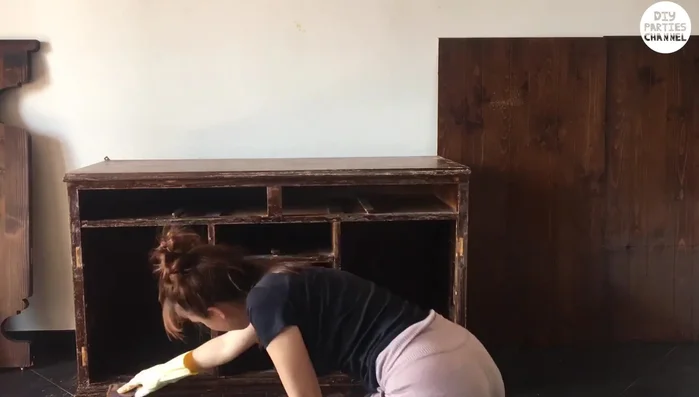 Clean the surface and fill any holes with stucco.