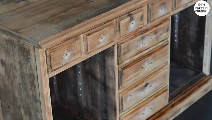 Clean the surface and fill any holes with stucco.