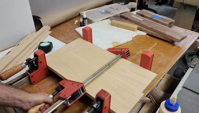 Plane the Walnut pieces to ensure even thickness and a smooth surface.