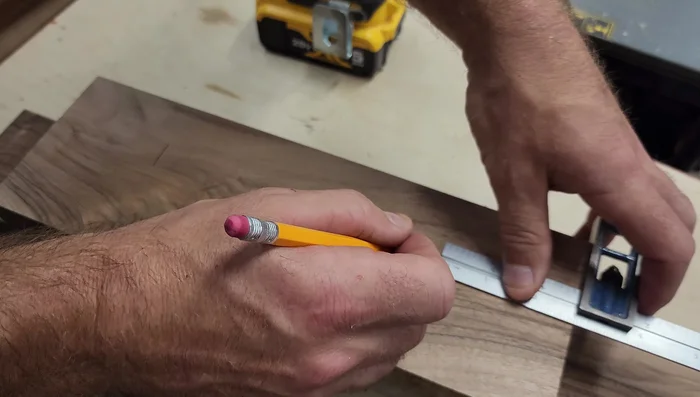 Address the cracked knot by super gluing it back in place and carefully routing around it. (Note: This step is presented as a possible solution and not always guaranteed to work.)