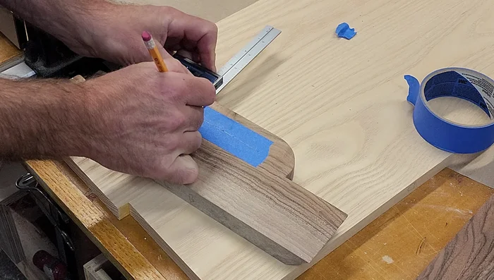 Address the cracked knot by super gluing it back in place and carefully routing around it. (Note: This step is presented as a possible solution and not always guaranteed to work.)