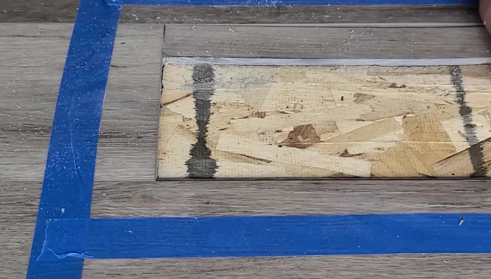 Completely cut the groove off the new plank using a utility knife, leaving only the tongue.