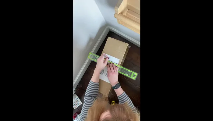 Cut and glue the bottom shelf pieces together, making sure the top part is the same depth as the top shelf for support.