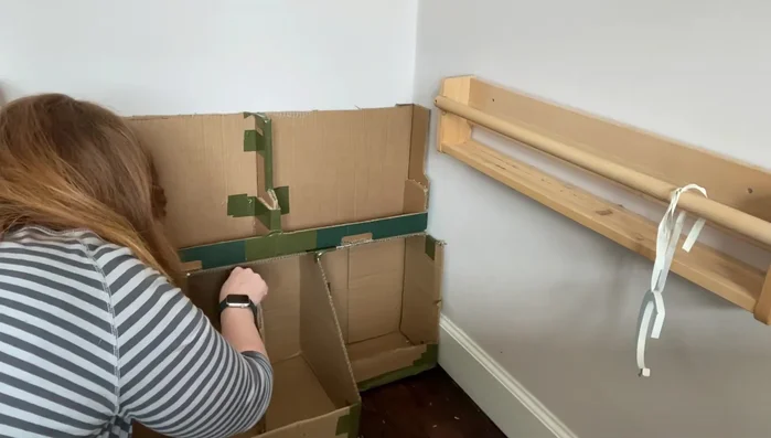 Glue the top and bottom sections of the bookcase together. Add a central support piece for added strength.