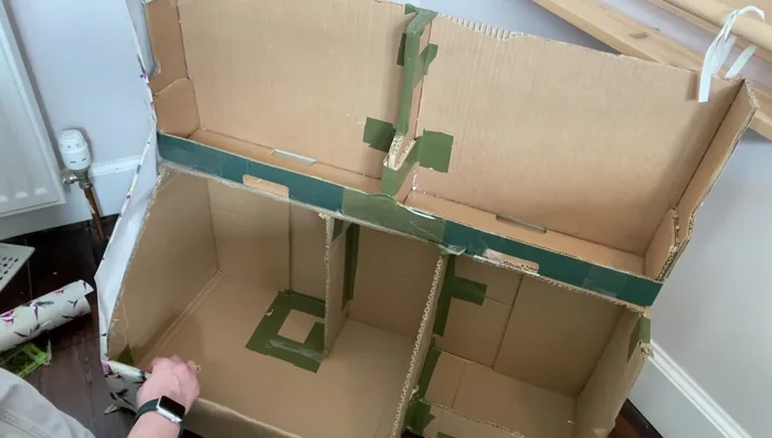 Wrap the finished bookcase with decorative paper or contact paper.