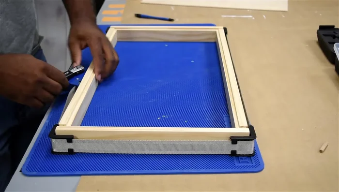 Create drawer slide tracks using a router and making sure there's a little play for smooth operation.