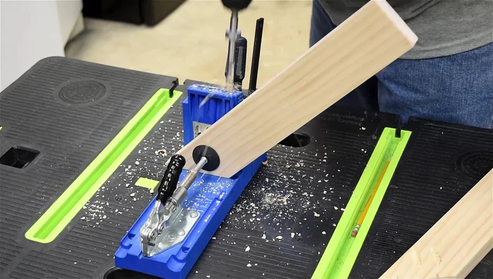 Install the lower panel and bottom using pocket holes and glue.