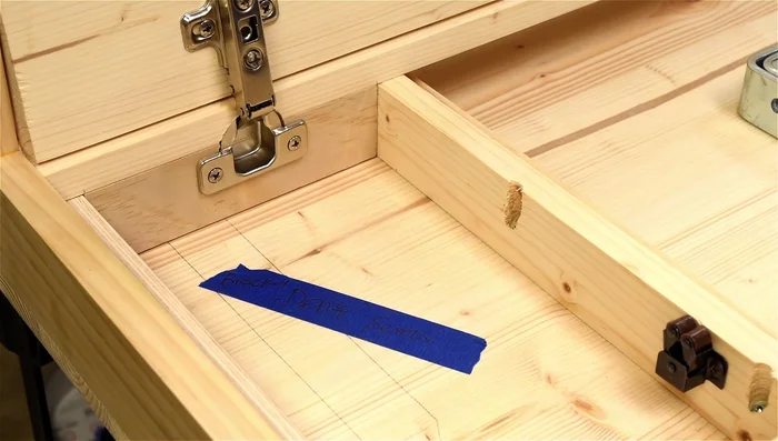 Attach the desk to the wall brackets using screws.