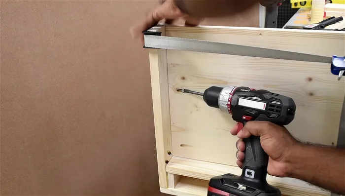 Install the lower panel and bottom using pocket holes and glue.