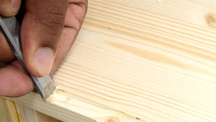 Paint the desk and stain the drawer (optional).