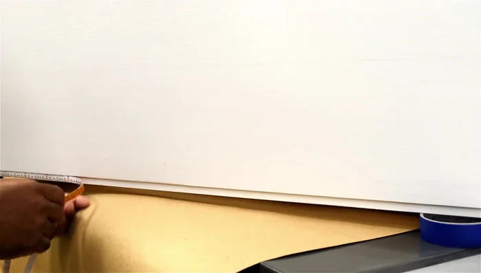 Paint the desk and stain the drawer (optional).