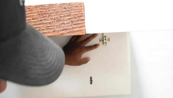 Attach the final hardware and accessories.