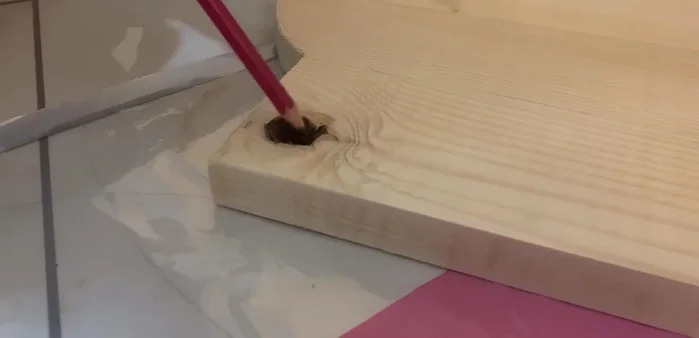 Fill imperfections (bumps, dents, holes) with wood filler.