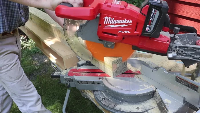 Cut decorative angles on posts: Cut a 45-degree angle at the top of each post.