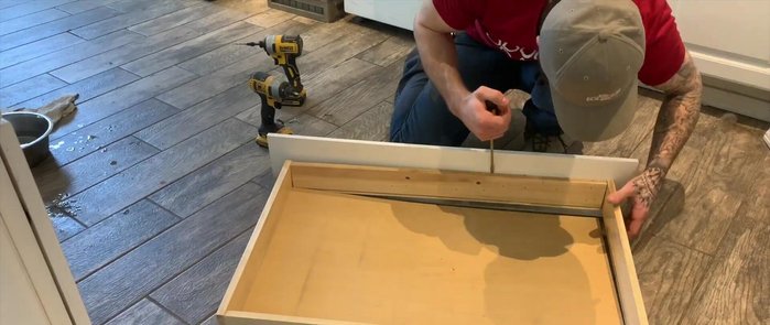 Install the drawer handle.