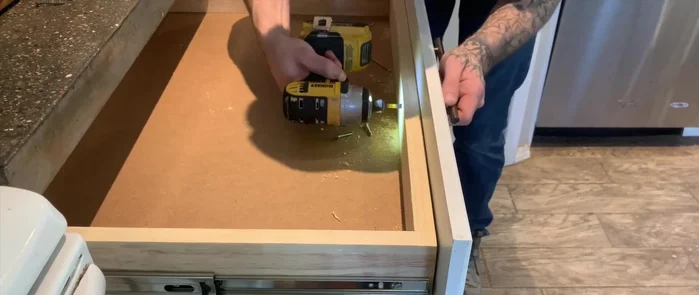 Install the drawer handle.