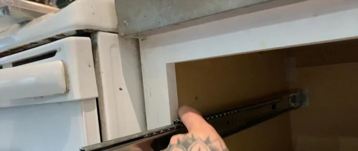 Mount new drawer slides to the cabinets.