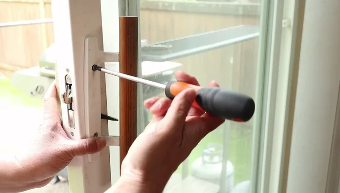 Reattach the handles. If screws are difficult to insert, loosen all screws to allow for wiggle room before tightening them again.