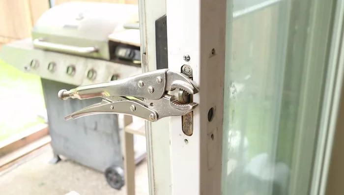 Remove the old latch from the door frame.