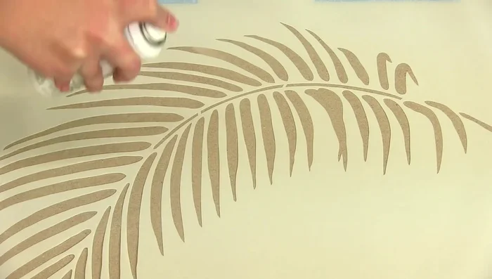 Apply spray adhesive to the back of your stencils to prevent bleeding.