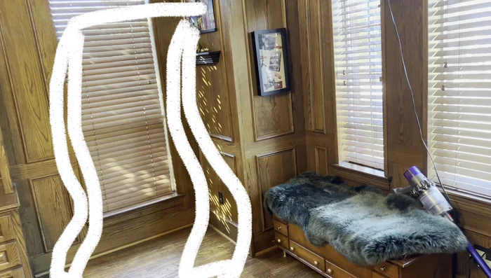 Create a reading nook with a house and curtains to brighten the space.