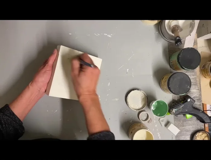 Create a shelf sitter: Paint a small sign with buttercream color. Decoupage a mushroom napkin onto the sign. Distress edges with additional paint for a vintage look.