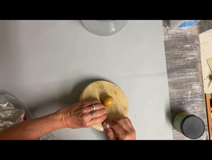 Paint jar lids: Apply two coats of Mint Julep paint to all lids, including the insides.